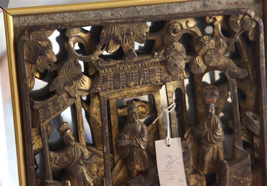 A pair of Chinese giltwood panels with later bevelled mirror frames, 150.5 x 75cm